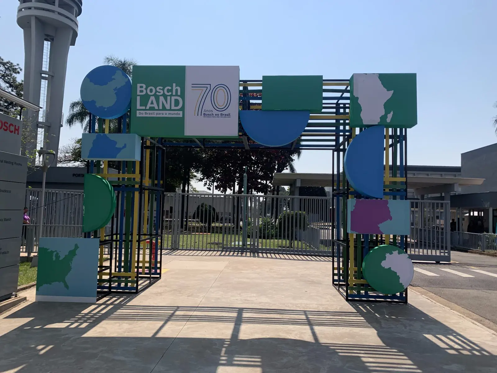 Boschland entrance gate, with the 70-year seal and panels cut in the shape of maps